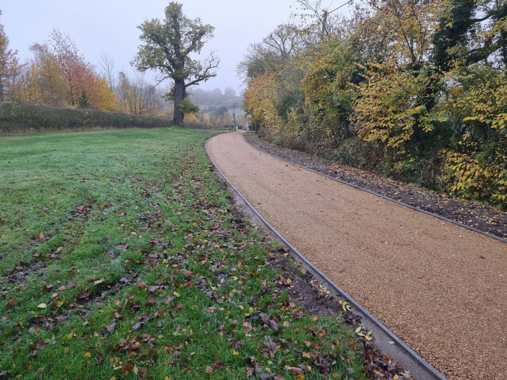 This is a large driveway which has just had a tar and chip driveway installed on by Linton Driveway Installations